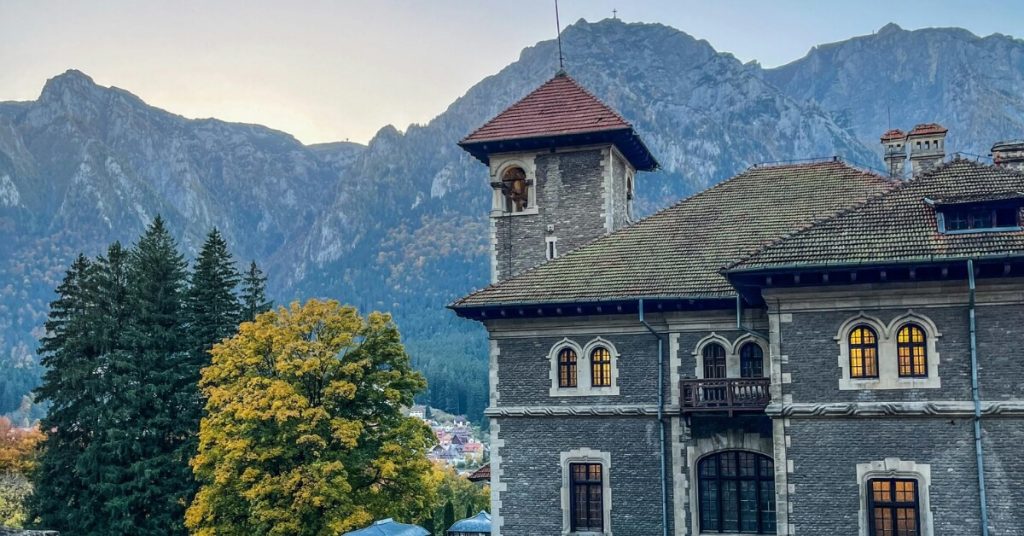 Cantacuzino castle with mountains in the background